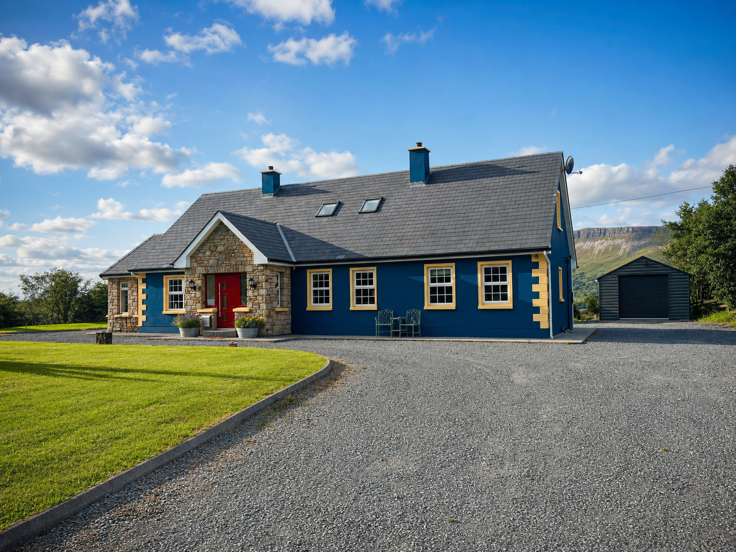 Freshly painted deep-blue Irish country house with cream trim near Tullaghan